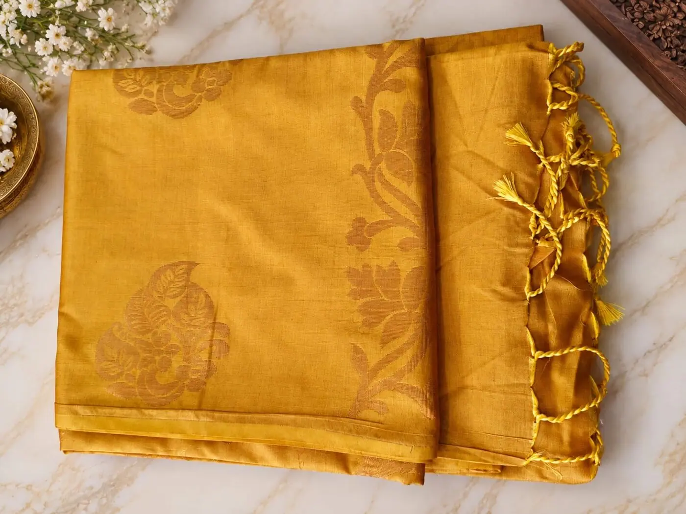 Turmeric yellow saree with tonal self-woven peacock and floral motifs